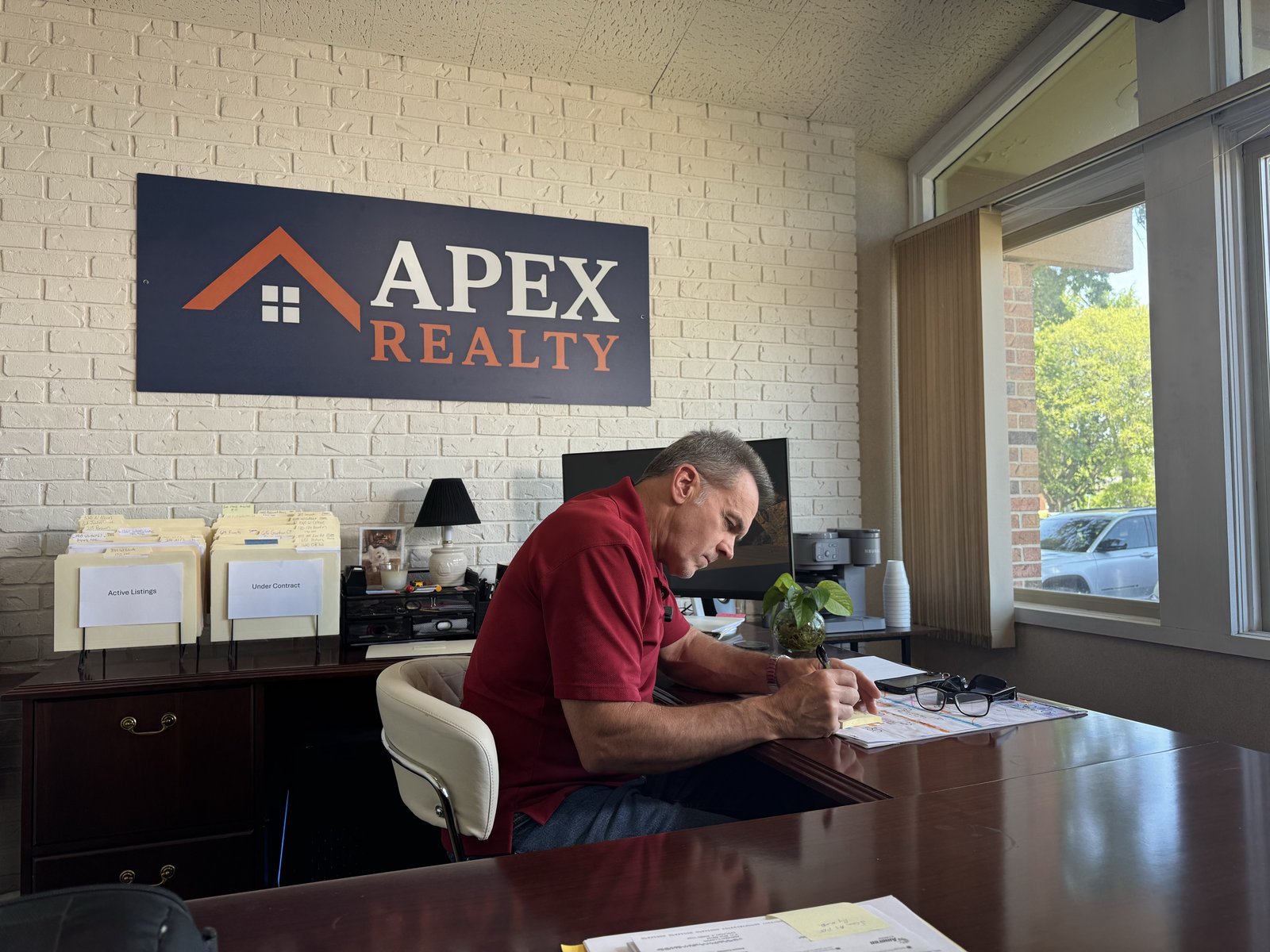 Dominic Casey at the Apex Realty office in Jacksonville, Illinois